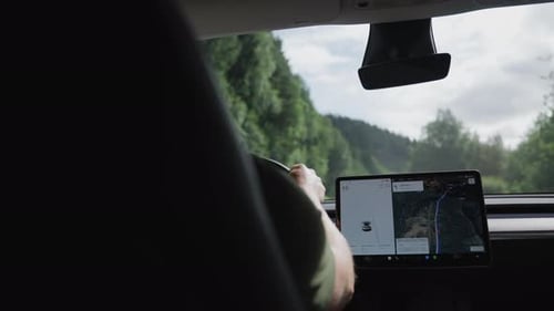 Driving An Electric Car With GPS Navigation
