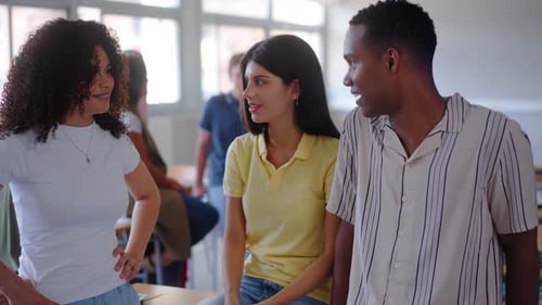College Students Chatting in Classroom