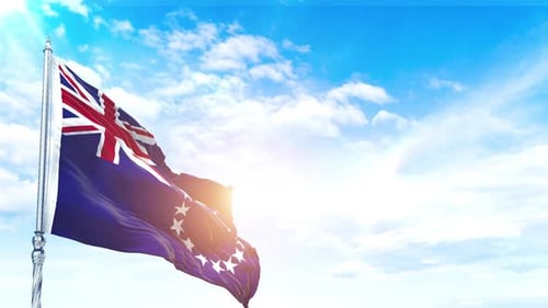 Cook Islands Flag Waving Realistically in Blue Sky