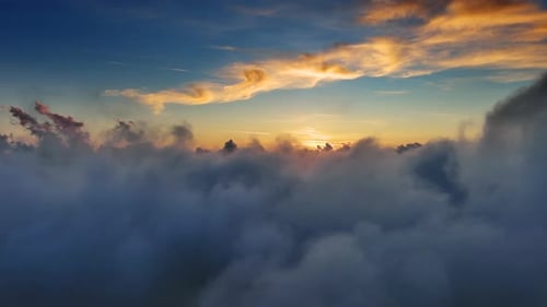 Aerial View of Clouds and Sunset Sun