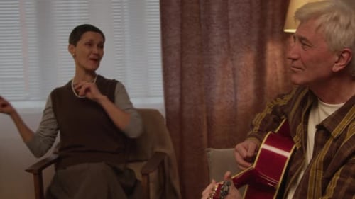 Diverse Elderly Residents Singing and Having Fun in Nursing Home