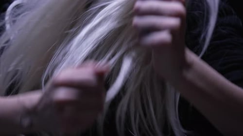 Anxious Young Woman Clenching Fists, Looking Stressed