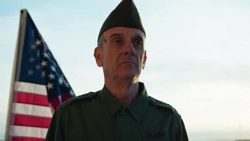 Man in US Army Uniform with American Flag