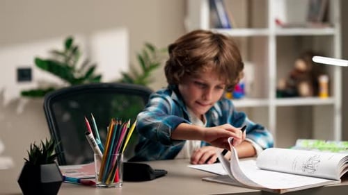 Focused Child Doing Homework at Desk