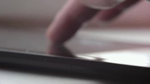 Fingers Touch Screen of Mobile Device Close Up