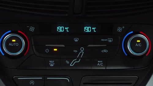 Reducing speed of rotation of fans of the car air conditioner from maximum to minimum, two-phase