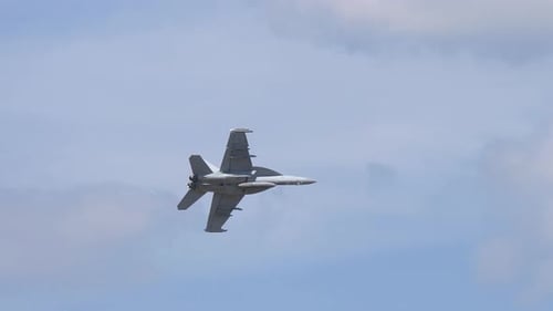 Fighter Jets Flying in Formation on a Sunny Day
