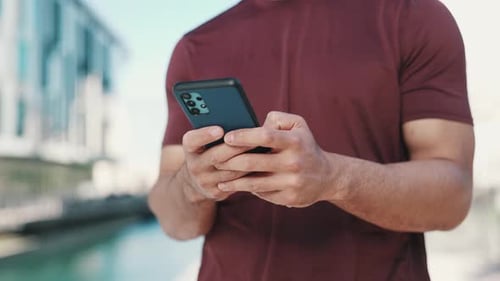 Man, phone and hands typing in city for outdoor communication, networking or online browsing