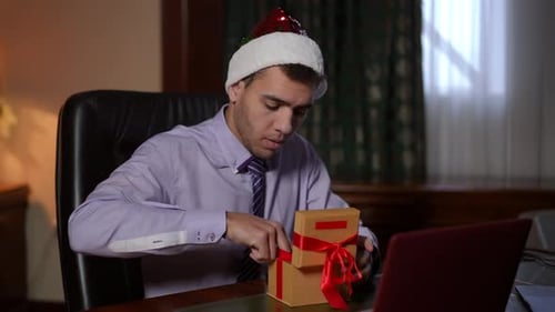 Join Our Festive Holiday Celebration at Work with a Gift Exchange and Santa Hats