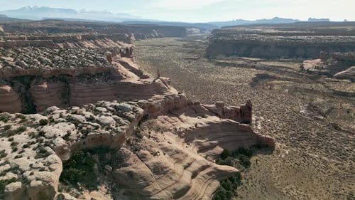 Flying through the Utah desert viewing red rock canyons