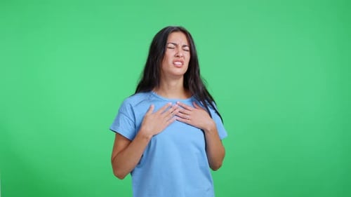 Woman with Bad Cough Feeling Unwell on Green Screen Background