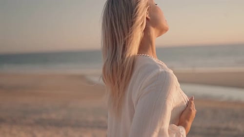 Woman Relaxing On Beach