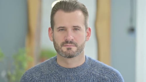 Portrait of Serious Middle Aged Man