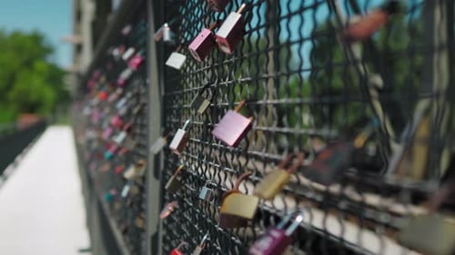 Love Locks on a Metal Bridge in City