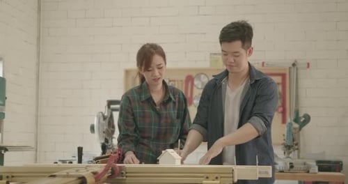 Two carpenter teamwork building design wood house drawing model measure scale size