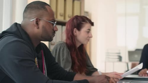 Head of Department Asking Team to Share Ideas about New Project at Meeting