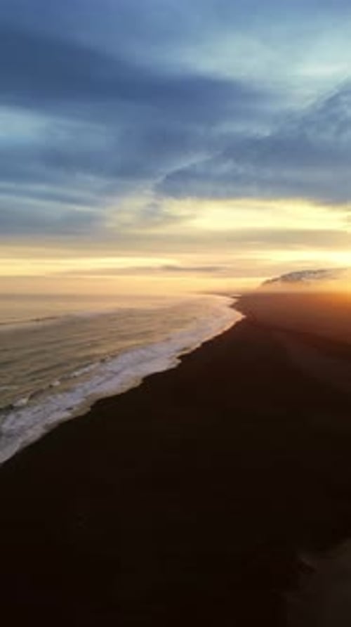 Vertical Video Icelandic Black Sand Beach Aerial View
