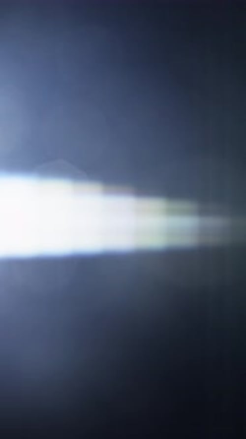 Shining Light Rising Along The Left Edge Of A Dark Frame