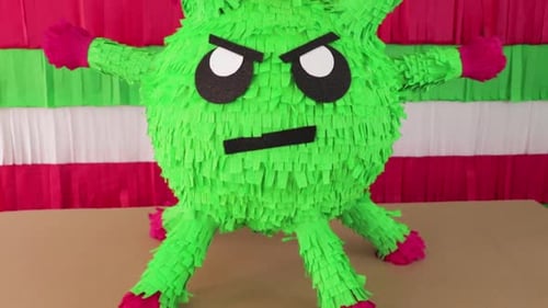 Coronavirus piñata. Mexican Crafts. Covid pandemic. Tilt.