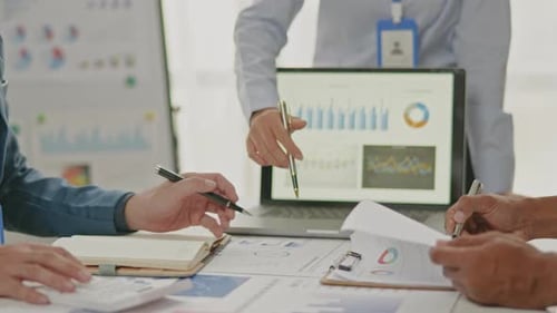 Close up of business hands are working and brainstorming on paperworks.