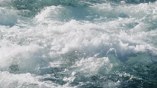 Dynamic and Mesmerizing Ocean Waves are Crashing and Flowing Beautifully in Crystal Clear Water