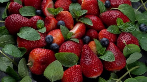 Bright Strawberries and Blueberries with Fresh Mint