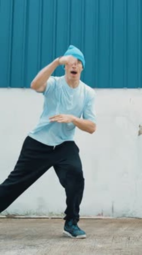 Young street dancer dancing in hip hop style with friend cheer behind. hiphop.