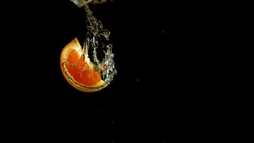 Super Slow Motion Orange Slices Fall