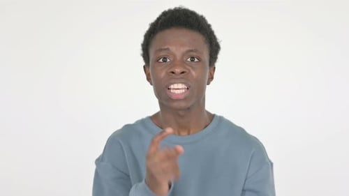 Young Adult Talking Directly to Camera on White