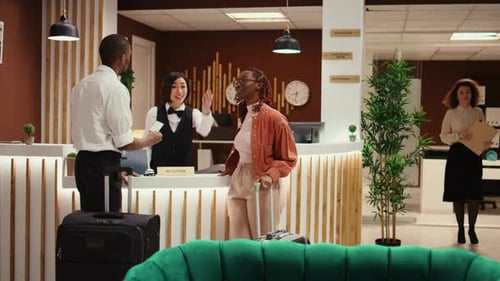 Bellboy Showing Tourists the Way