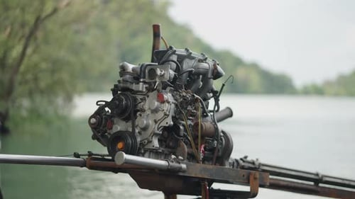 Car Engine Modified and Installed on Longtail Thai Wooden Boat in Thailand Closeup