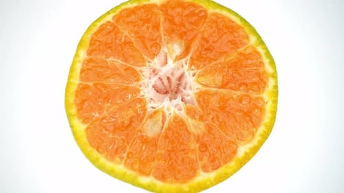 Close-up showcases a fresh half orange with vibrant.
