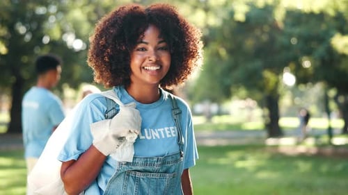 Trash bag, face and black woman for volunteer work, recycling or cleaning of park for nature