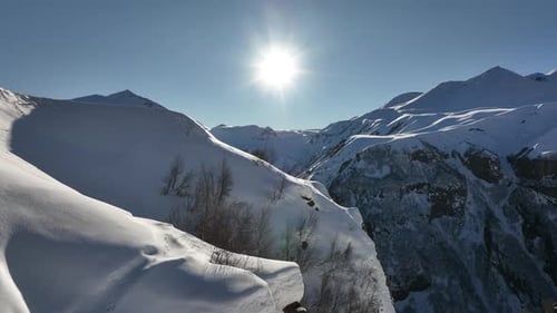 Aerial view of beautiful snowy mountains in Gudauri, Georgia