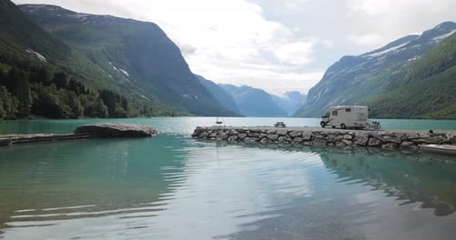 Family vacation travel RV, holiday trip in motorhome. Beautiful Nature Norway natural landscape.