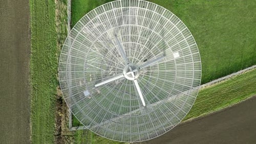 Overhead View of Large Satellite Dish on Farmland