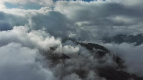 Aerial High View of Dramatic Clouds Flying