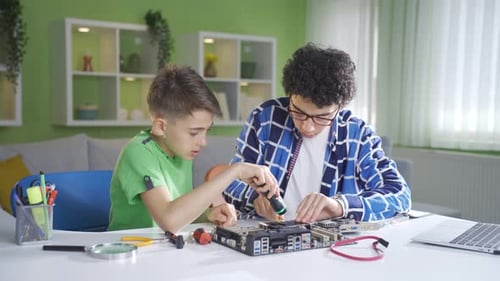 Two tech-savvy friends fix the part and rejoice.