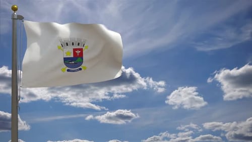 Realistic Waving Flag with Victoria City Emblem Against Blue Sky
