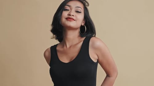 Asian Woman Demonstrating Outfit