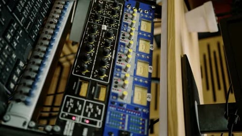 old displays of professional analog volume meters in a recording studio measuring and showing