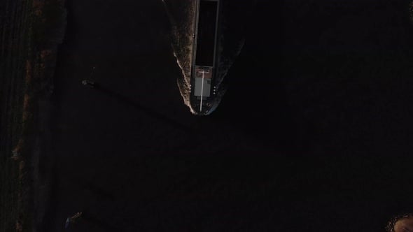 Graphic abstract minimalist top down rotating aerial view of cargo ship ...