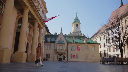 Beatiful woman walking in Primate's Square, Bratislava, Slovakia