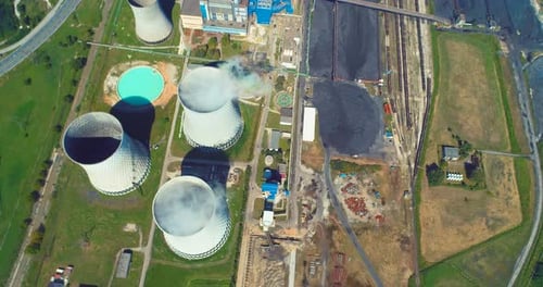 Aerial View of Coal Power Plant High Pipes with Black Smoke Moving Up Polluting Atmosphere at Sunny