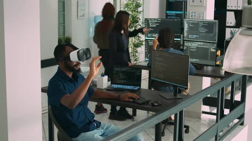 Man Using VR Headset in Modern Office