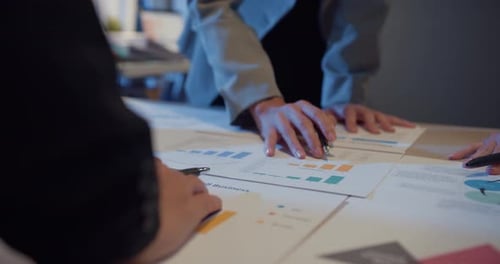 Asia people meeting brainstorming ideas about new paperwork project colleagues working together.