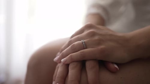 Close Up of Woman's Hand With Diamond Ring