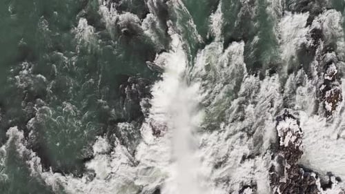 Aerial view of a river and waterfall Urridafoss in Iceland