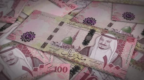 Pile of Saudi Arabia riyal cash money, inflation concept. Closeup new Saudi Arabia hundred riyal