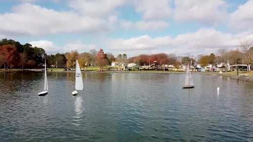 Sail boat racing across the lake.